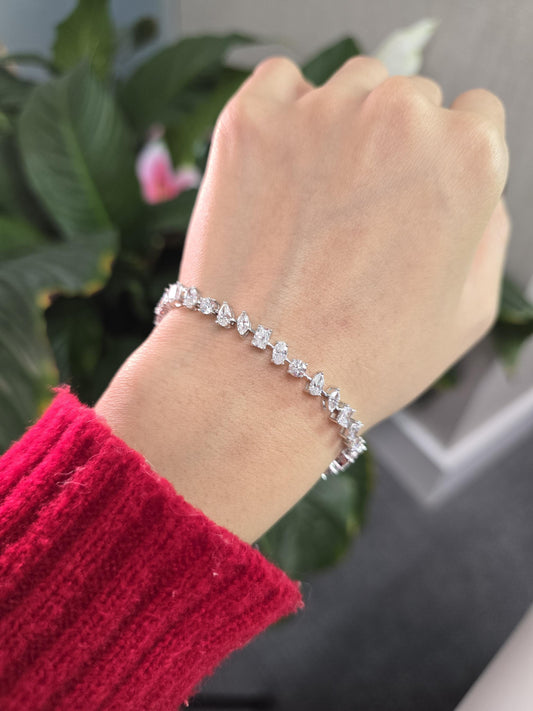 Luxurious 7cts Lab Grown Diamond Bracelet with Multi-Shaped Pear, Radiant, Oval, Marquise, and Round Diamonds, a dazzling masterpiece.